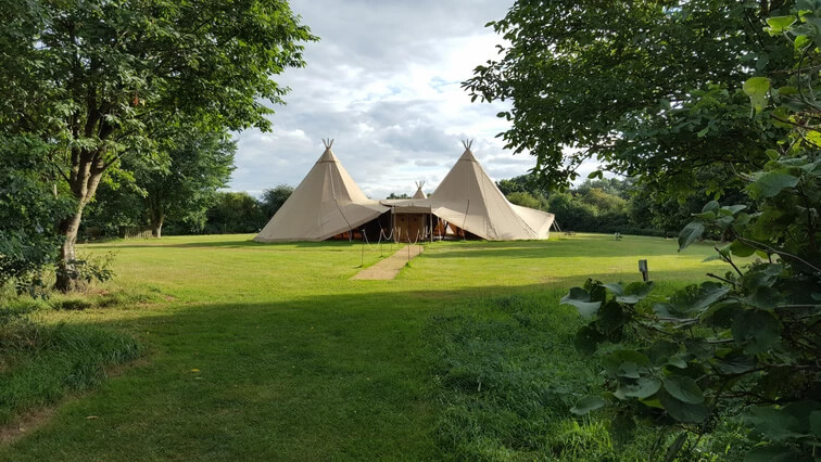 Wedding tipis set up in the grounds of Welford Park a stunning private estate for Berkshire Wedding Venues
