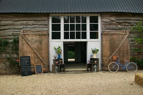 Rural rustic wedding set up at Templars Barn a countryside Berkshire Wedding Venue