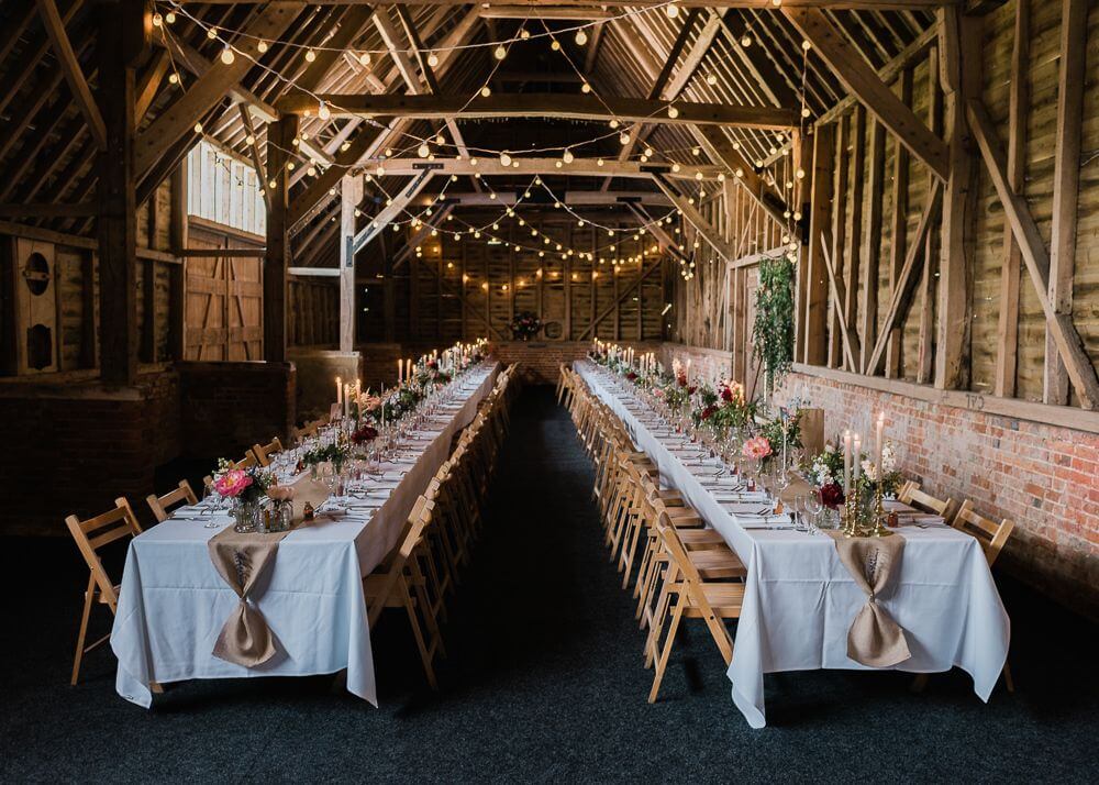 Wedding table and chairs inside North Hidden Barn a rustic Berkshire Wedding Venue
