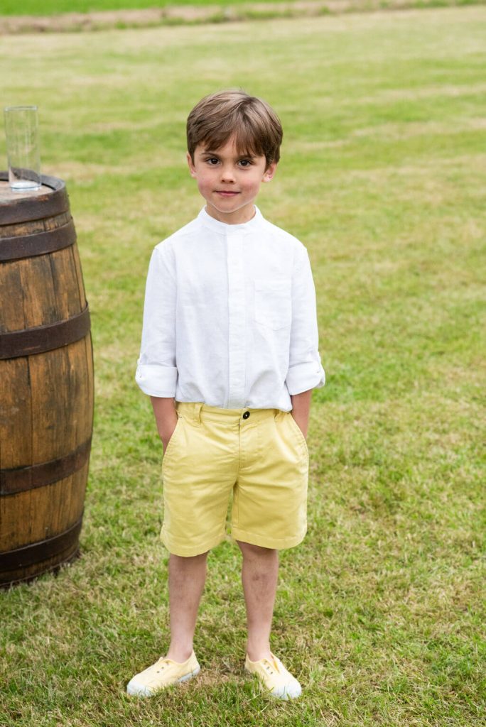 page boy at wedding with yellow sandles