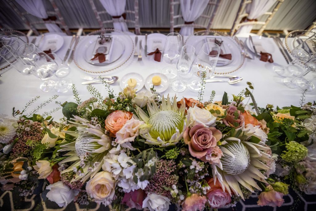 Autumnal flowers by Fall into Flowers on wedding table The Berkeley London city wedding