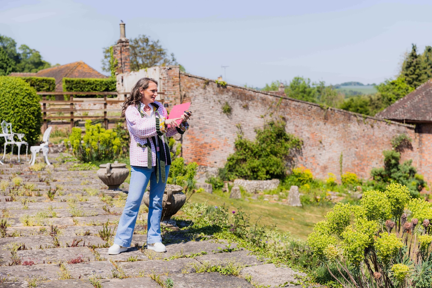 Wedding Planner vs On-the-Day Coordinator What Do You Need planner outside looking at site Antonia Wedding Planner planning an outdoor wedding