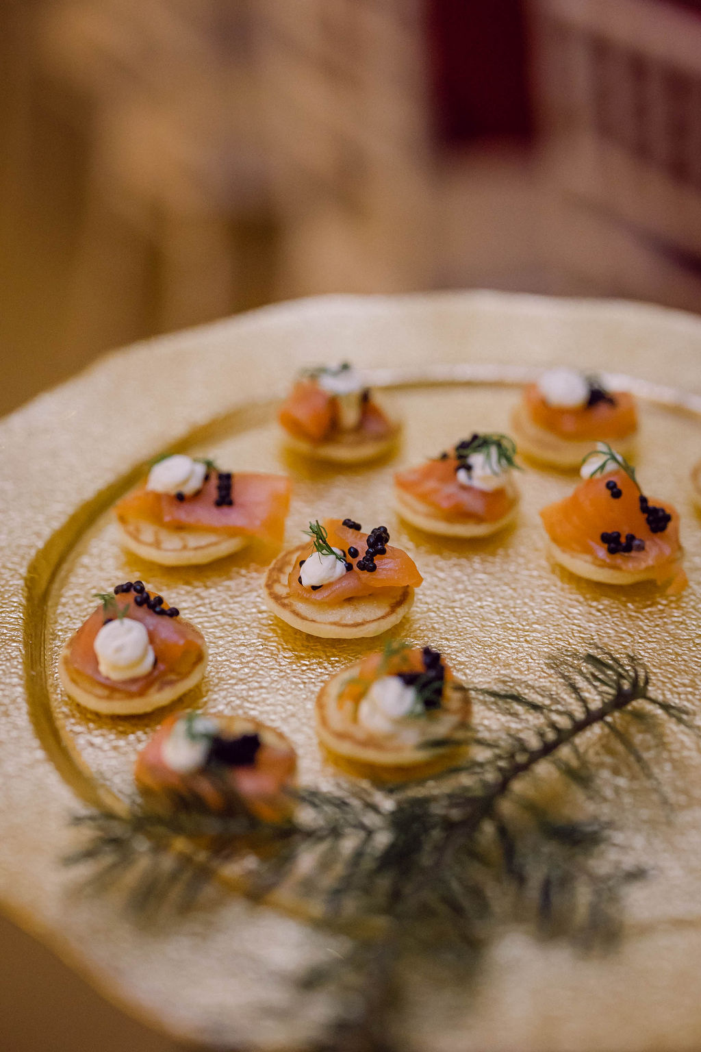 salmon canapes on gold platter at Welford Park wedding in Berkshire