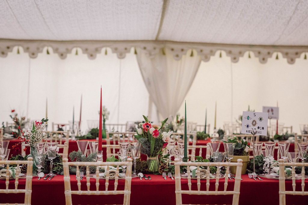 red and green decor for Christmas marquee wedding in Berkshire