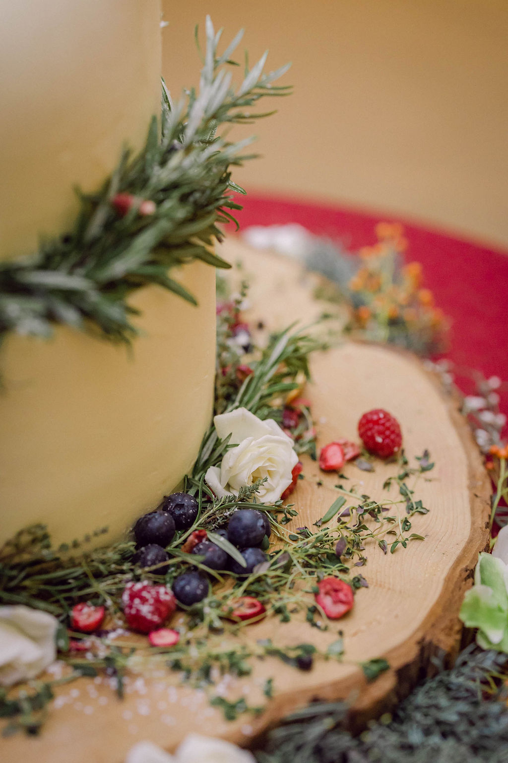 christmas wedding cake with pine and berries in berkshire