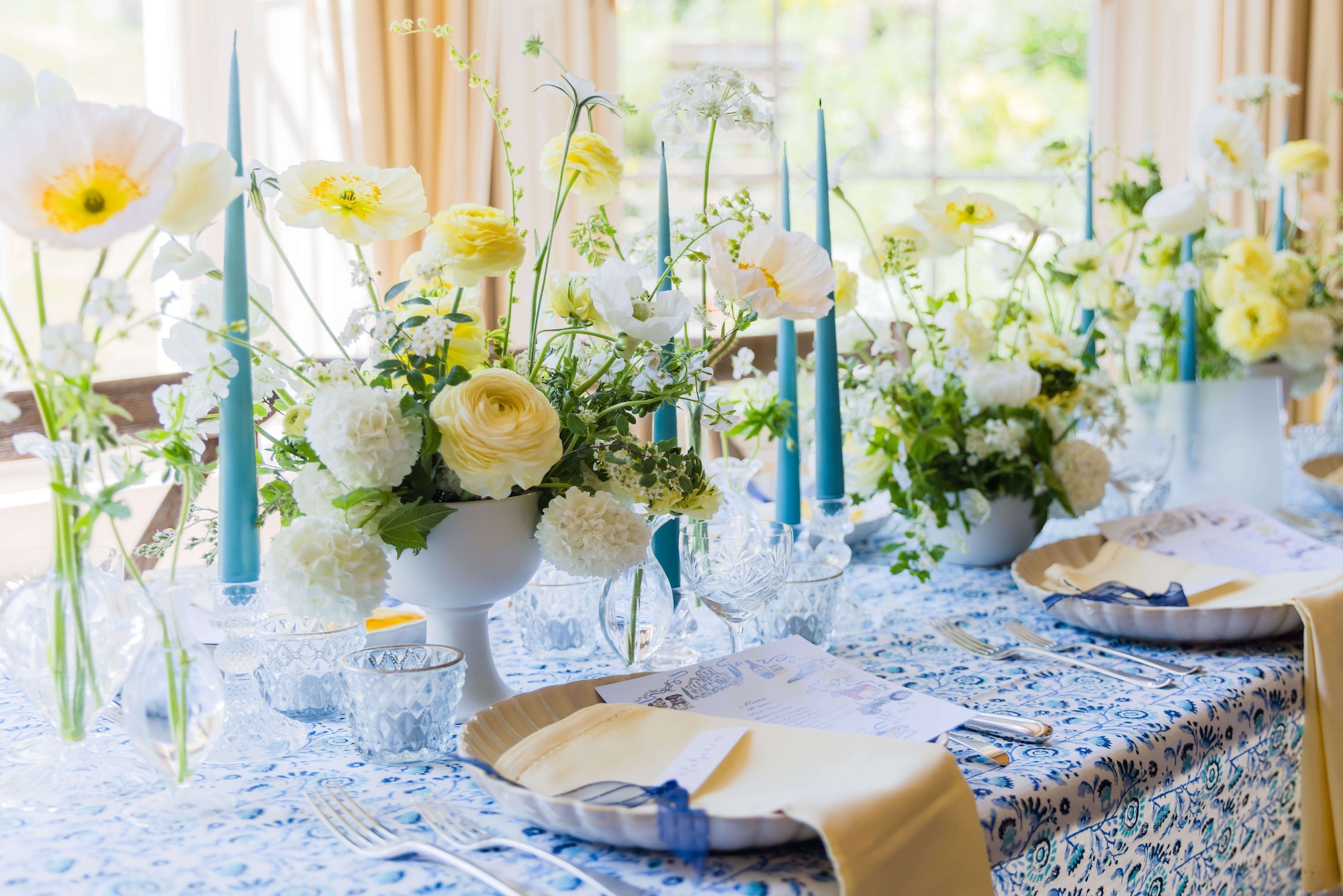 Blue and yellow themed wedding breakfast styled by Honour and Pop